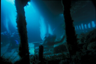 Divers inside the hold of the Tabarka, Scapa Flow